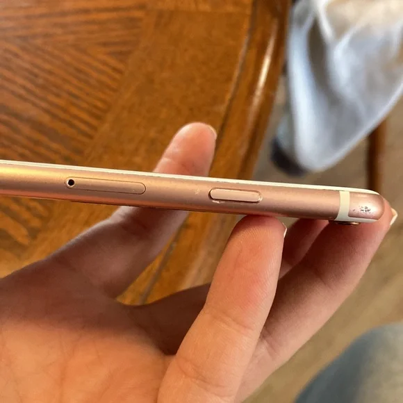 iPhone 6s some scratches but no cracks camera works great home button works.